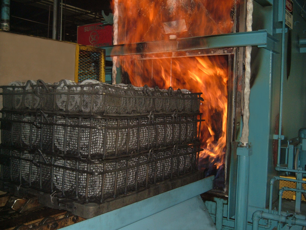 Parts Being Loaded Into a Furnace - 2